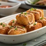 Crispy Bang Bang Salmon Bites served in a bowl with sauce