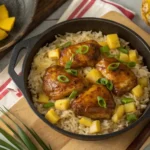 One-pan sweet and savory pineapple chicken and rice in a skillet