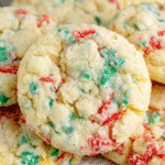 Soft gooey butter cookies dusted with powdered sugar