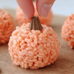 Rice Krispie Treat Pumpkins with Halloween decorations