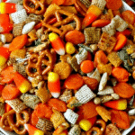 Halloween trail mix with fall snacks and decorations