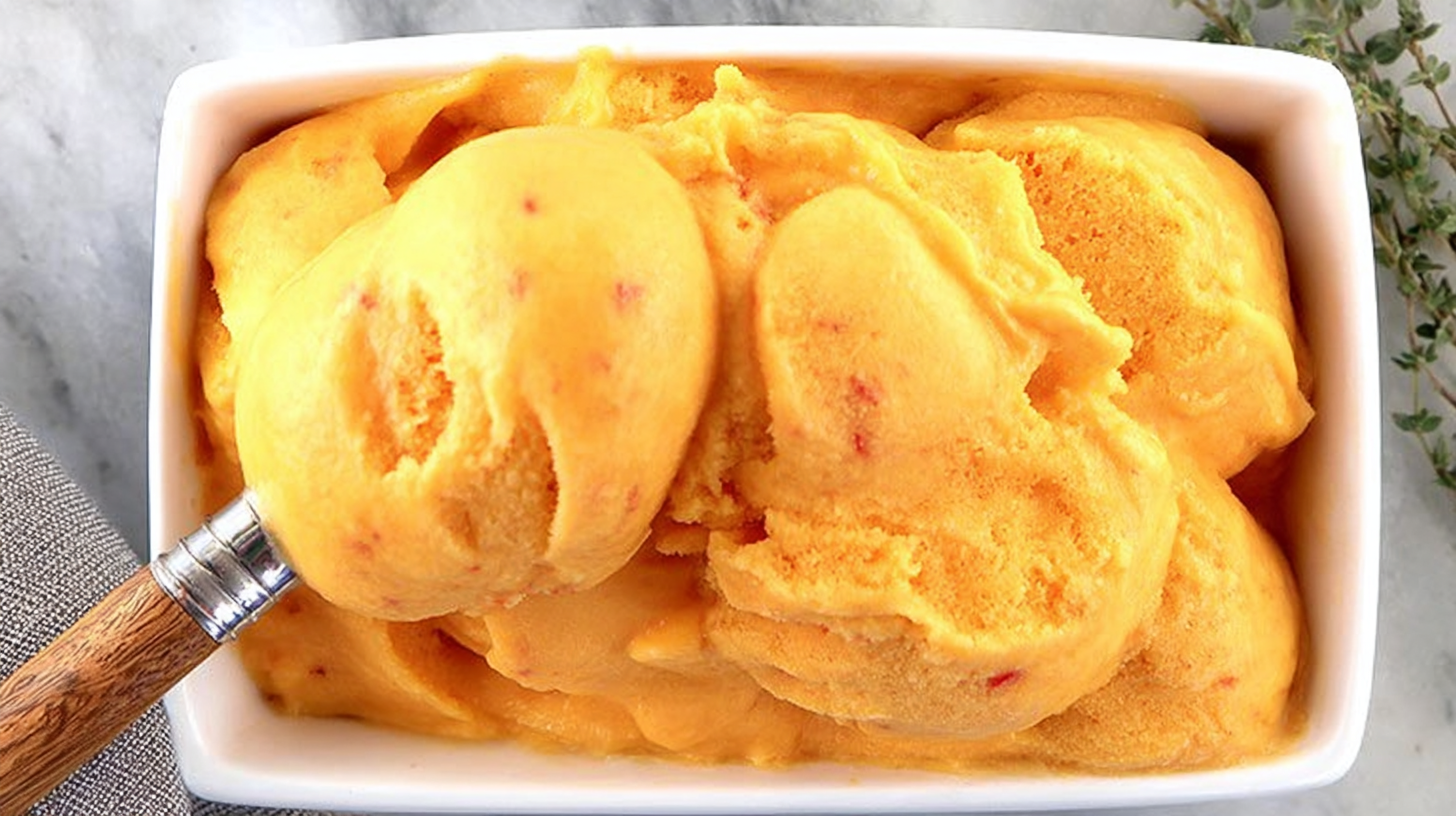 Bowl of Homemade Peach Sorbet with Mint