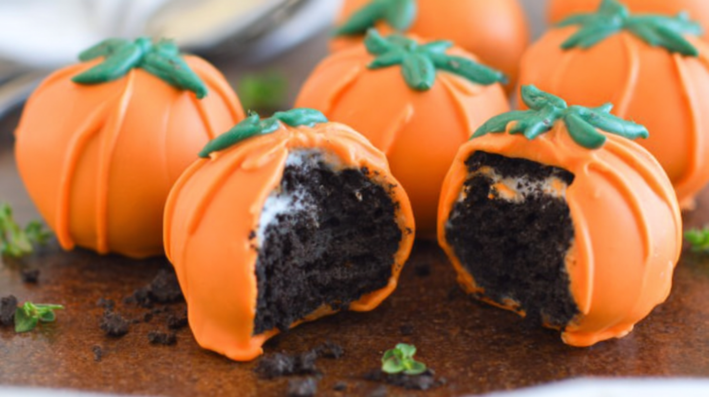 Halloween dessert table with Pumpkin Oreo Balls