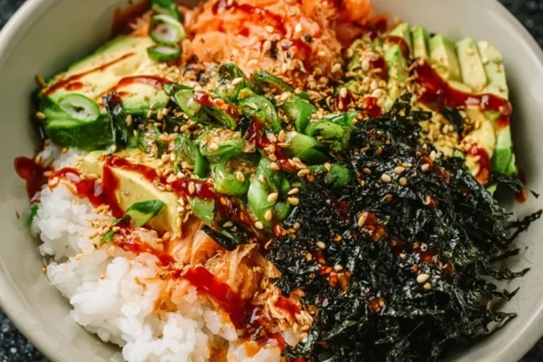 Delicious canned tuna sushi bowl garnished with fresh vegetables and rice
