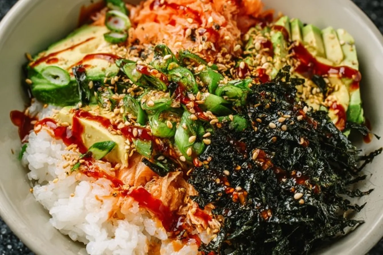 Delicious canned tuna sushi bowl garnished with fresh vegetables and rice