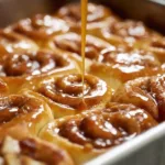Delicious caramel apple cinnamon rolls drizzled with caramel glaze