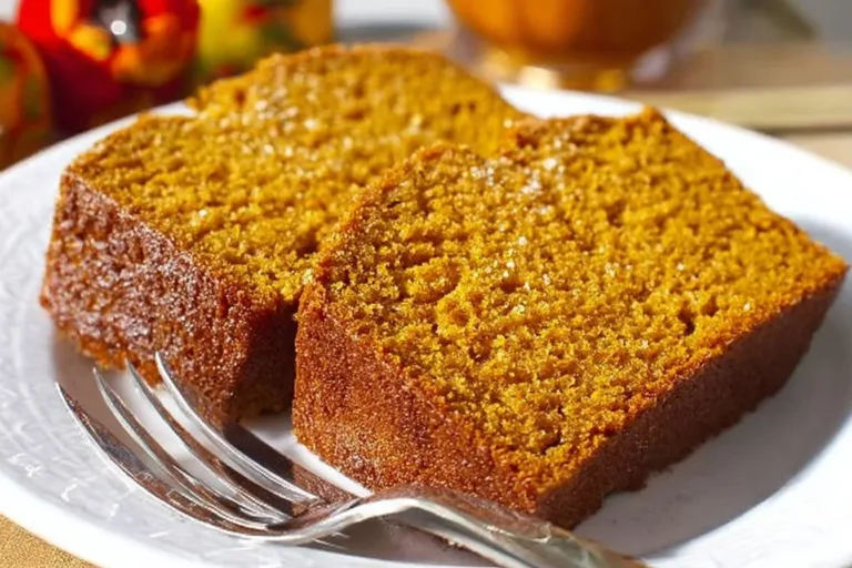 Slice of Snickerdoodle Pumpkin Bread with cinnamon sugar topping