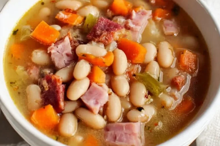 Crockpot ham and bean soup simmering in a slow cooker