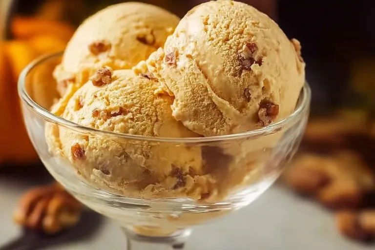 Creamy No-Churn Pumpkin Pie Ice Cream served in a bowl with a sprinkle of cinnamon