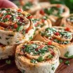 Chicken Taco Mexican Pinwheels served on a platter with toppings.