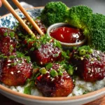 Plate of delicious Mongolian meatballs garnished with herbs
