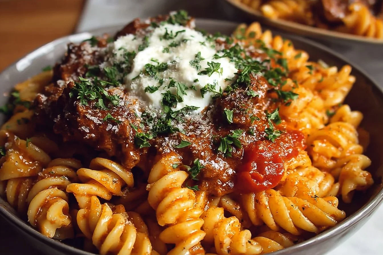 One pot creamy tomato beef pasta with herbs and cheese