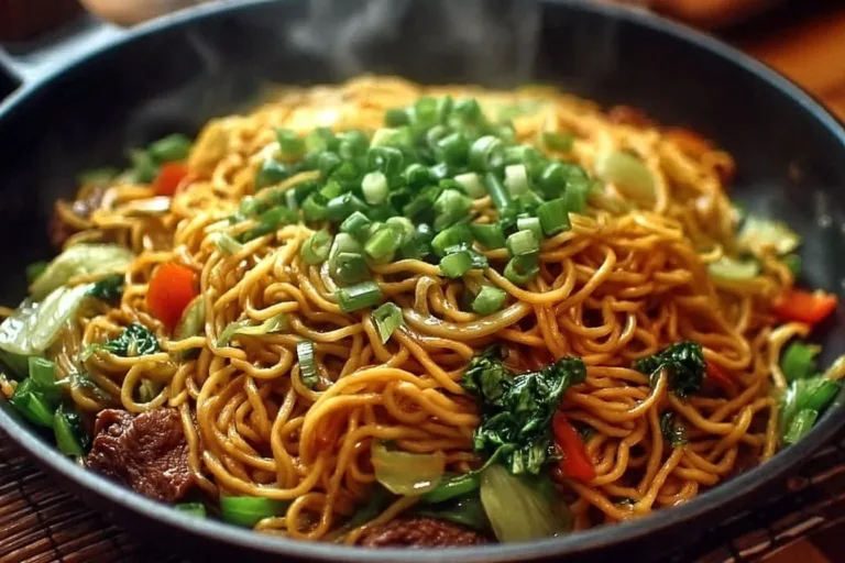 Delicious plate of Panda Express fried noodles with colorful vegetables