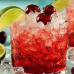 Refreshing Cherry Limeade Sonic Copycat drink served in a glass with lime and cherries