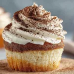 Delicious tiramisu cupcakes topped with creamy frosting and cocoa powder