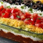 American Flag Layered Taco Dip served in a festive dish