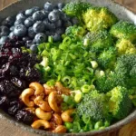 Colorful Blueberry Lemon Poppyseed Broccoli Salad with fresh ingredients