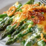 A delicious asparagus casserole fresh out of the oven, topped with crispy breadcrumbs.