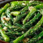 Plate of sautéed asparagus with garlic seasoning