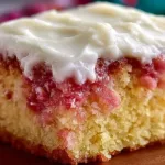 Delicious rhubarb cake made with cake mix, showcasing vibrant rhubarb pieces.